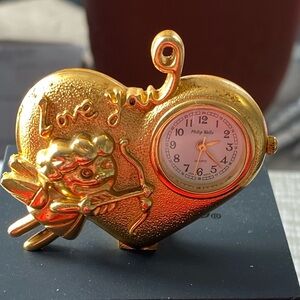 Miniature philip wells clock